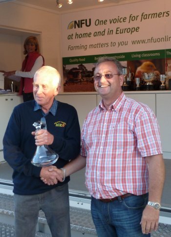 Brian Thompsett receives the UAP Trophy for the 'most meritorious orchard.