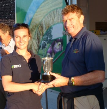Hayley Campbell-Gibbons presents the E.O. Moss Trophy for Overall Runner Up to Nigel Bardsley for Bluehouse Farm