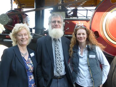Barabara, Nick and Claire Seymour pose in front of Barbara's Traction Engine