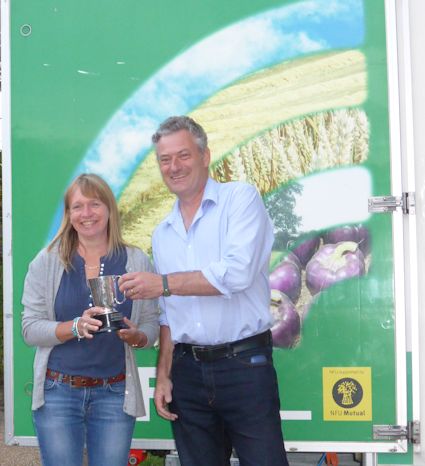 Andy Sadler presents Gay Hudd a trophy