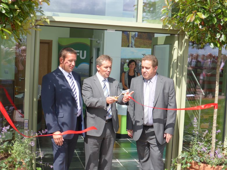 Justin King 'cuts the tape' to open the new Headquarters of A.C.Goatham
