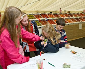 These children are having fun on the Orchard World stand