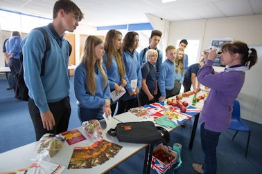 Sally Channon demonstrating how the sweetness (brix) of an apple is measured