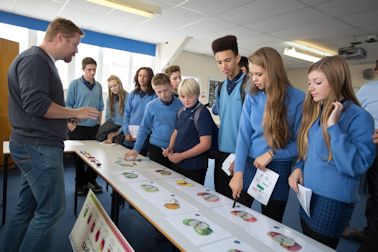 Simon Cannell of Chingford informing the young students about the mysteries of marketing