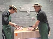Ian and Gary preparing pork joints